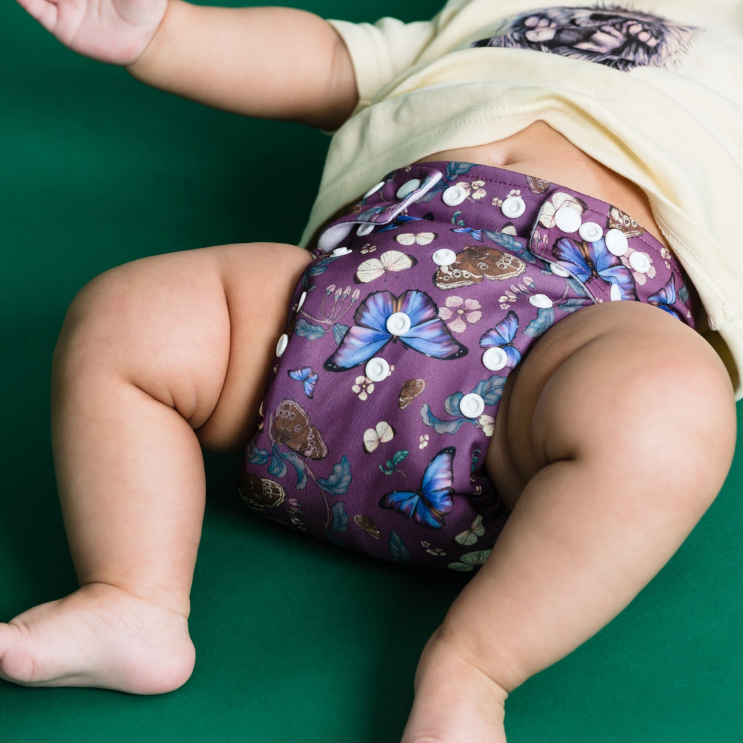 Baby wearing Onesize Reusable Pocket Nappy with butterfly illustrations by LittleLamb#color_butterfly-ballad
