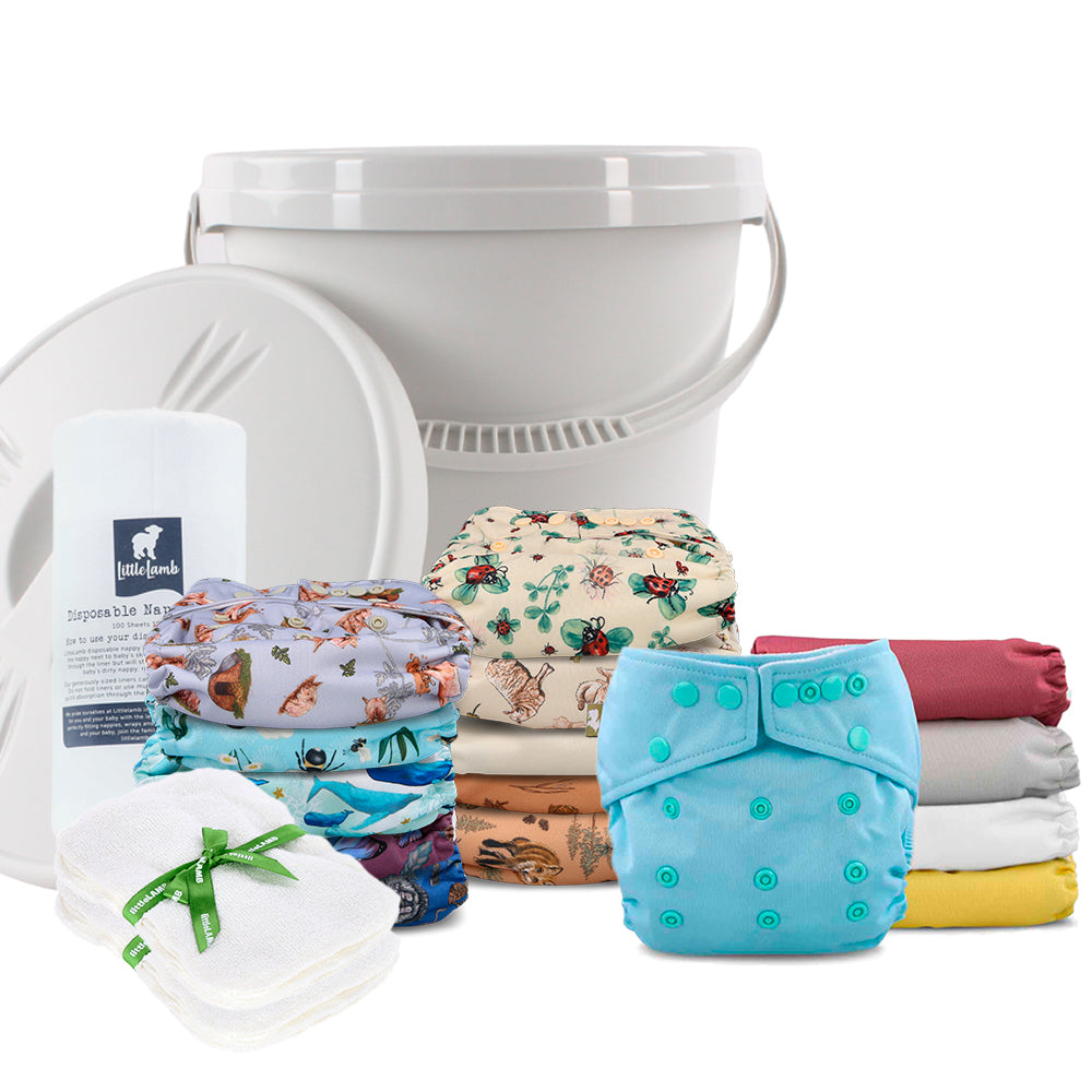 Onesize Pocket Nappy Complete Kit with bucket, wipes and liners in a selection of prints#color_mixture