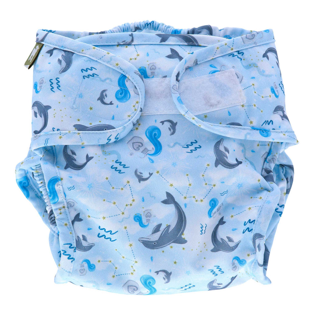 Little Lamb reusable cloth nappies - Aquarius printed nappy wrap - Blue nappy with dolphins and Aquarius star signs - front view