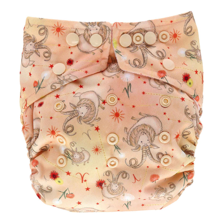 Aries Onesize Pocket Nappy by LittleLamb - coral nappy with goats and Aries star signs - front view